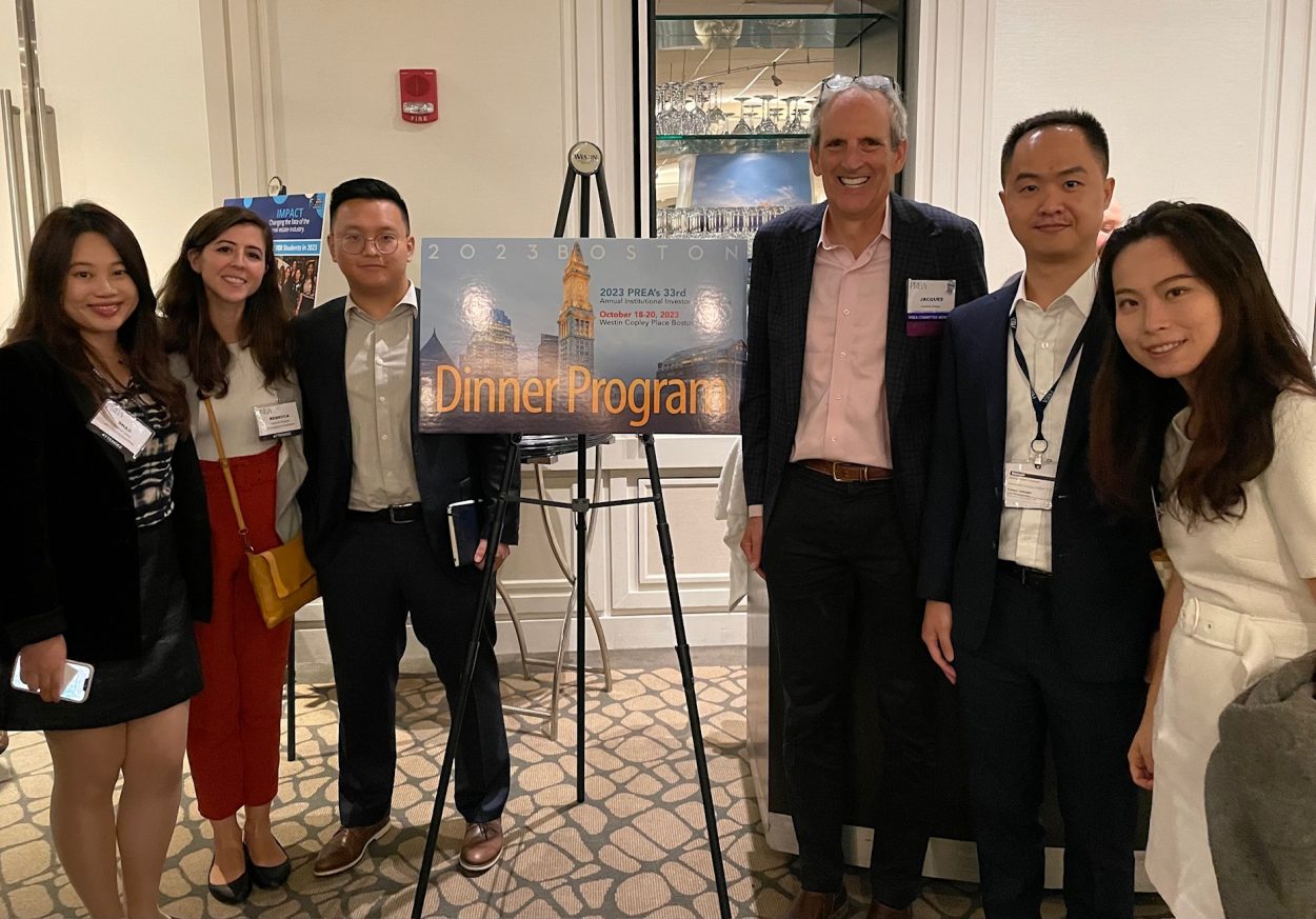 Wilson Ding Rebecca Caroline Glasgow Minyao Li Ashley Vicary Shao Lan Wang Ryan Wu Jacques Gordon stand in front of PREA conference poster